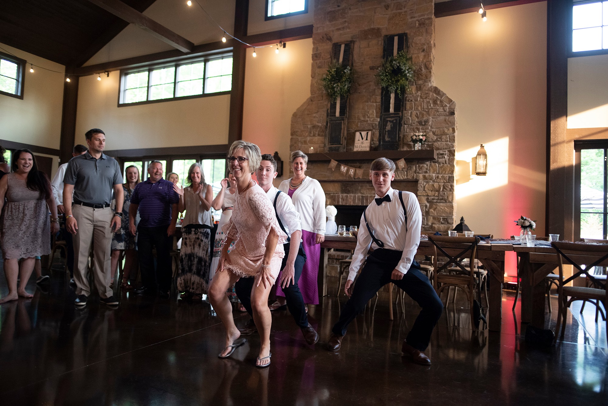 Couple Cutting Their Wedding Cake Beth Waterman Photography