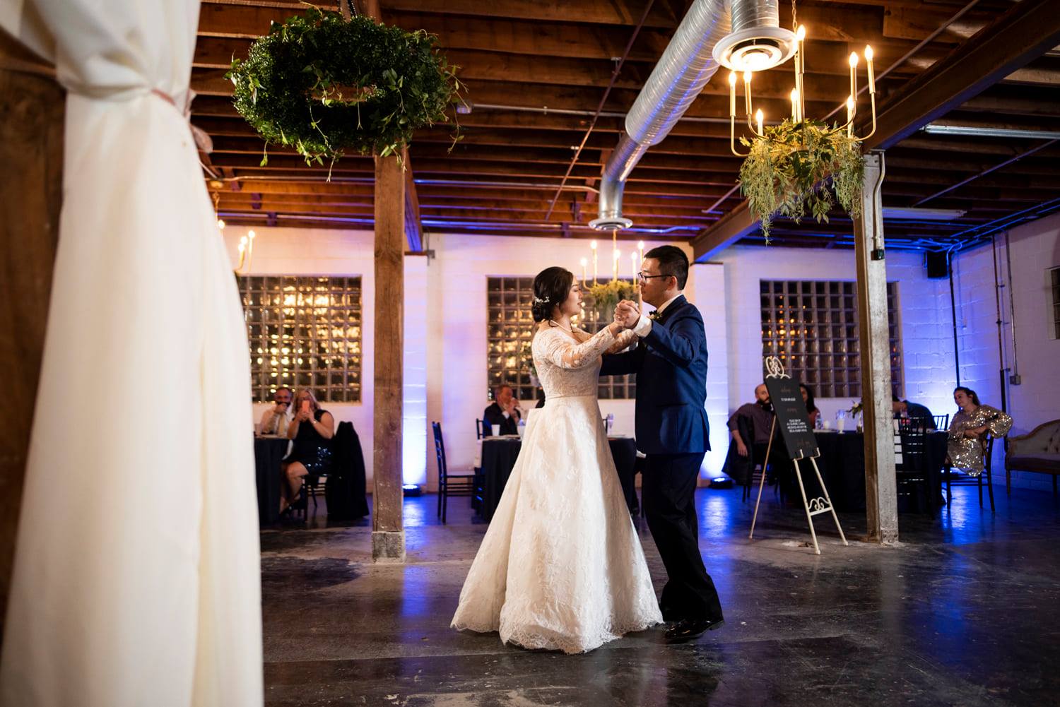 Bride and Groom Danceing with Uplighting in background