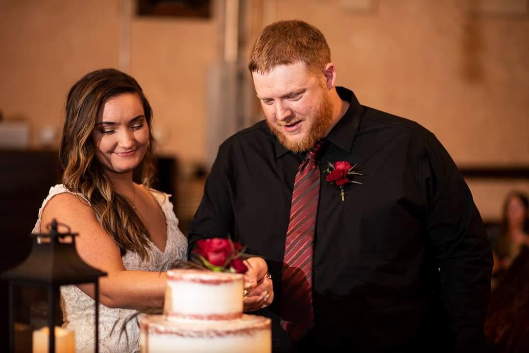 Couple Cutting Their Wedding Cake Beth Waterman Photography